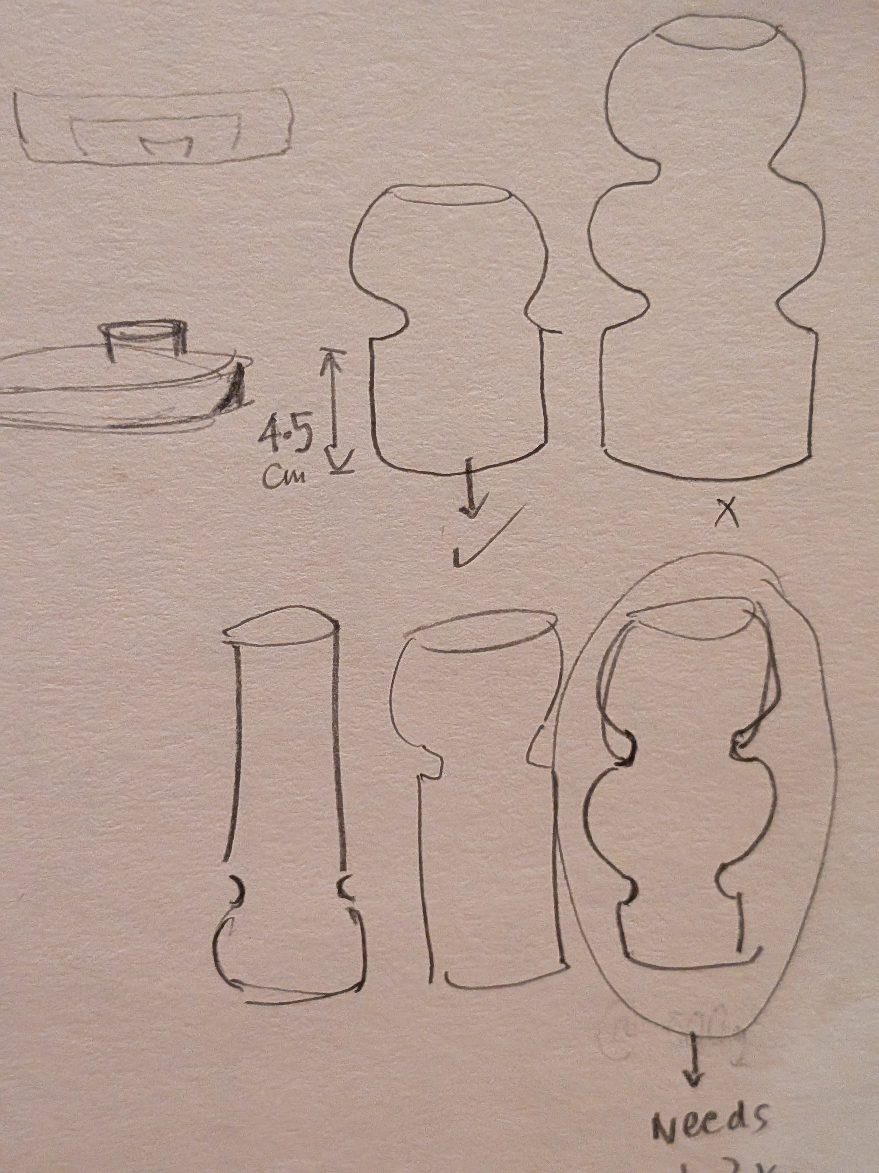 Hand-drawn sketches exploring vessel forms